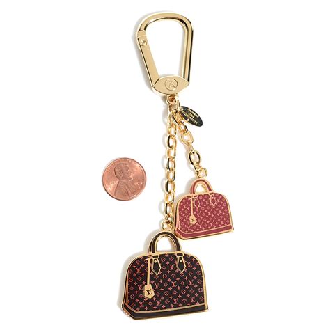 faux louis vuitton bag charms.